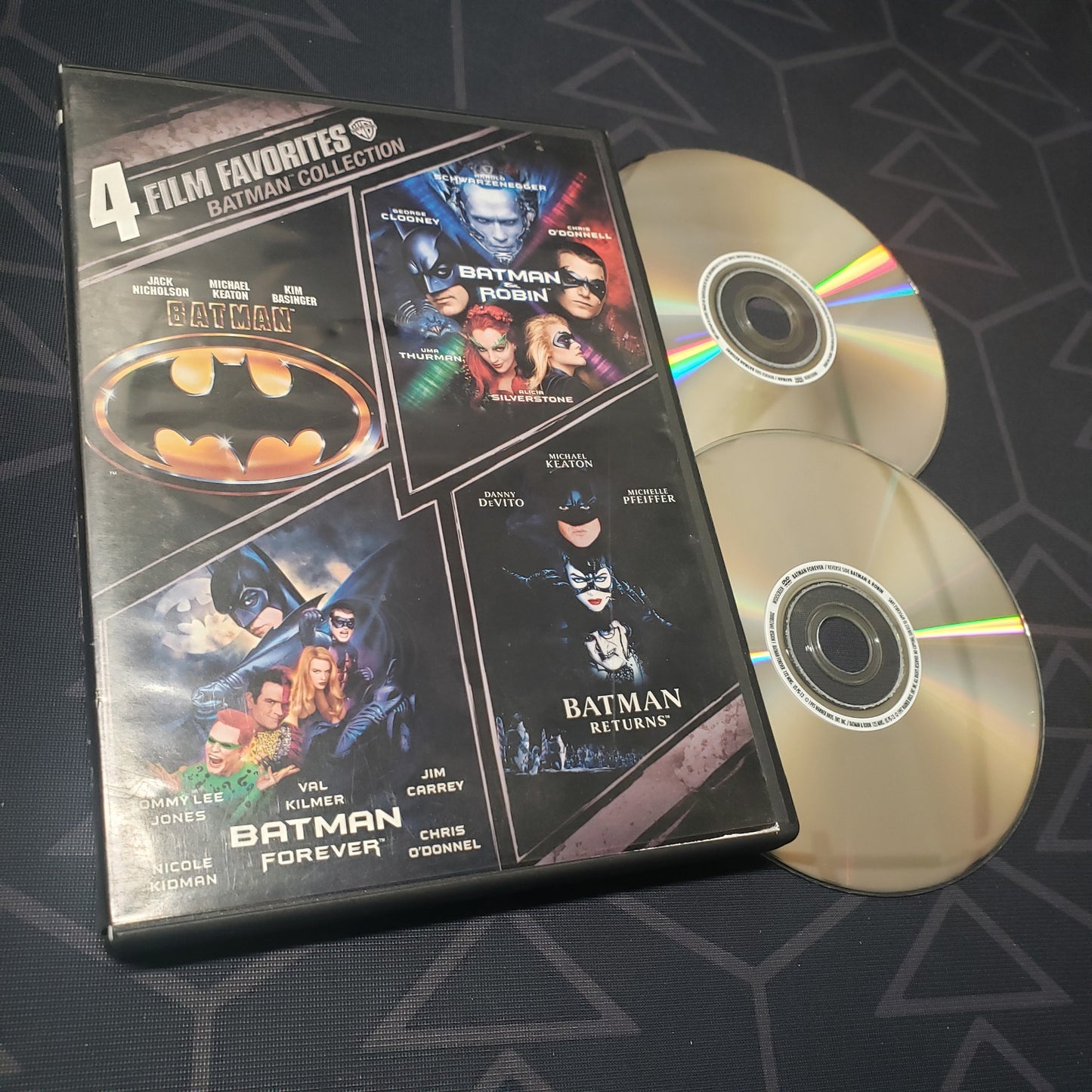 Image shows the case & two discs for the Batman: 4 Film Favorites movie set on DVD