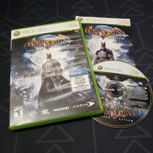 Image shows the case, manual and disc for the video game Batman: Arkham Asylum for Xbox 360