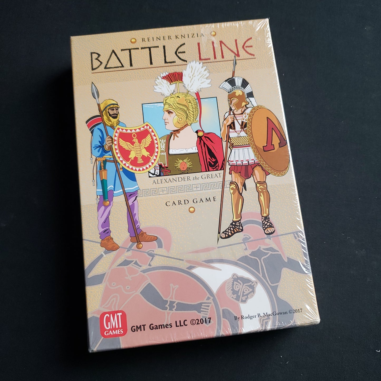 Image shows the front cover of the box of the Battle Line card game