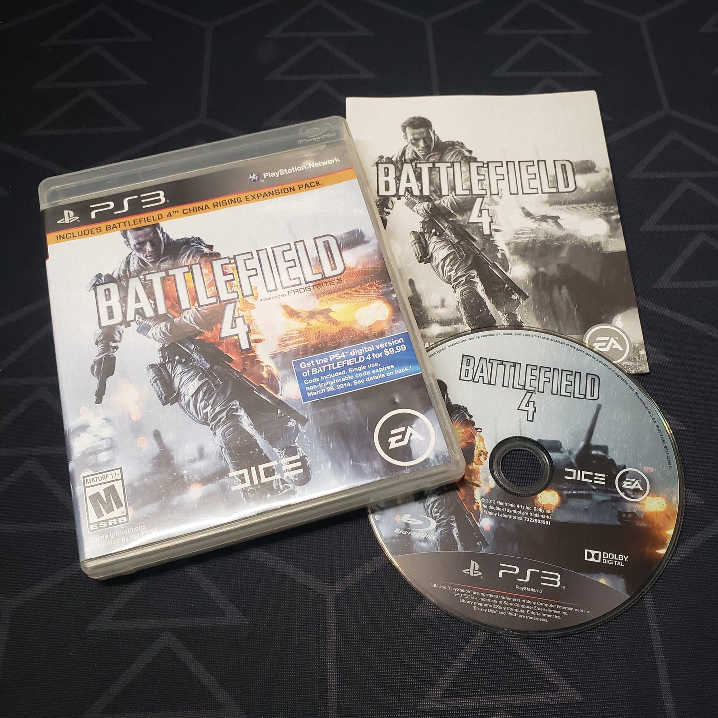 Image shows the case, manual and disc for the video game Battlefield 4 for Playstation 3