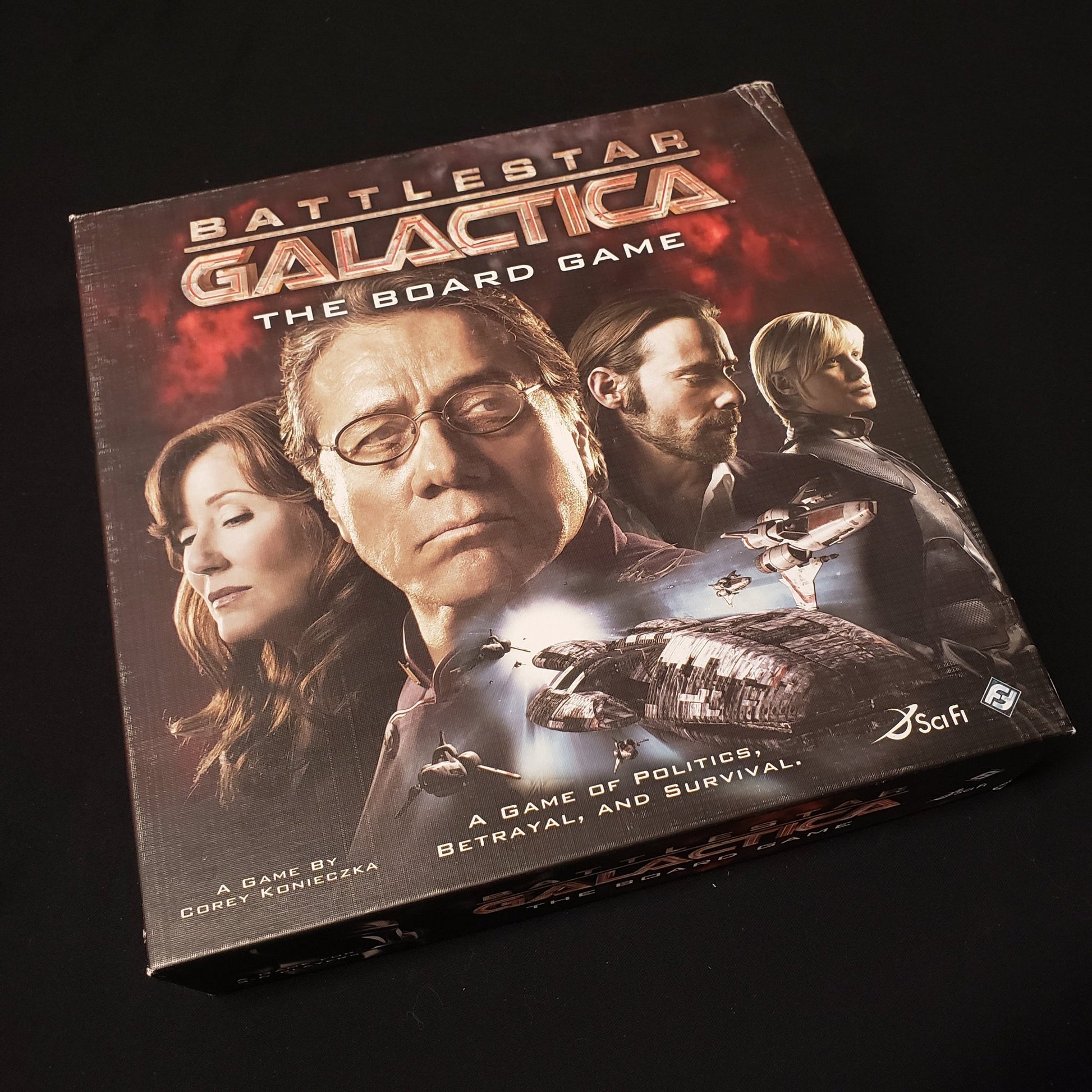 Image shows the front cover of the box of Battlestar Galactica: The Board Game