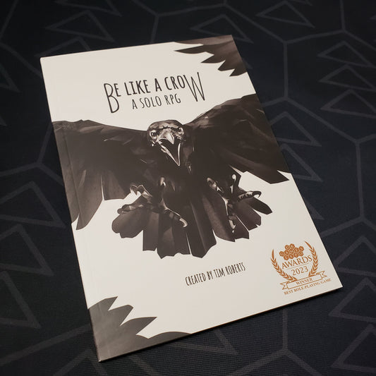 Image shows the front cover of the Be Like a Crow roleplaying game book