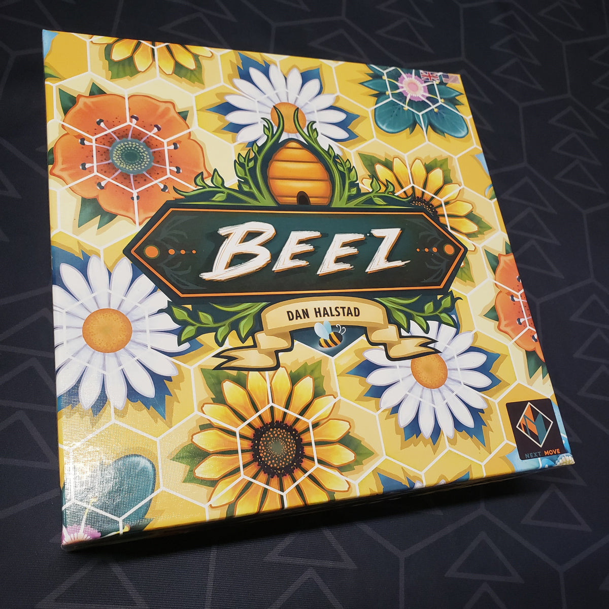 Image shows the front cover of the box for the Beez board game