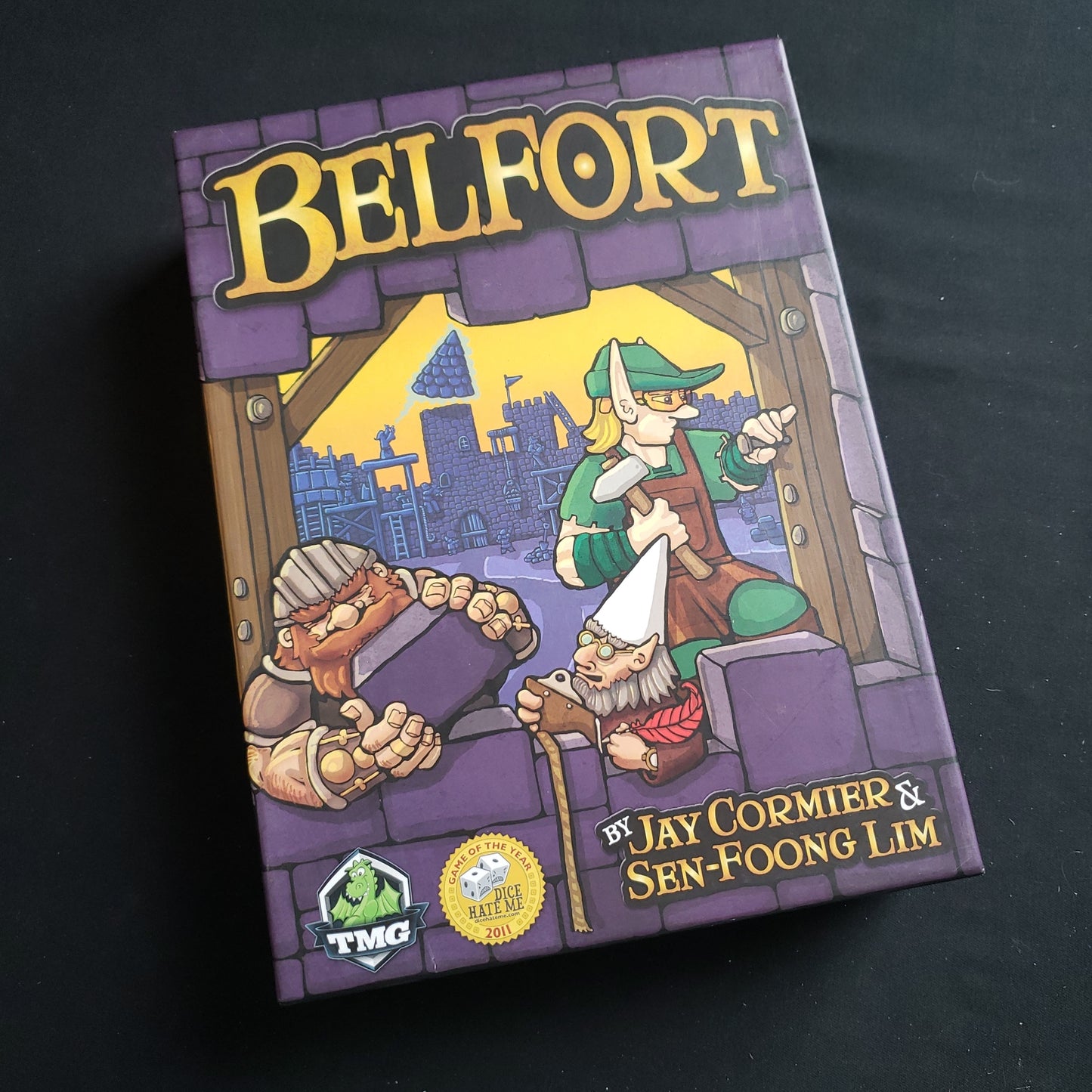 Image shows the front cover of the box of the Belfort board game