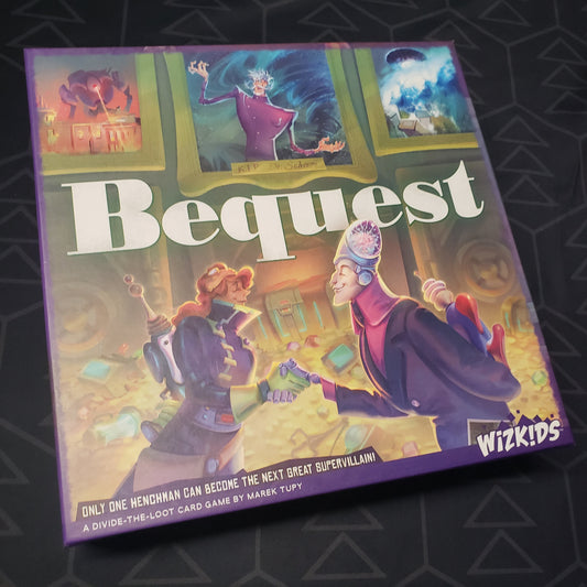 Image shows the front cover of the box for the Bequest card game