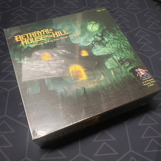 Image shows the front cover of the box of the Betrayal at House on the Hill board game