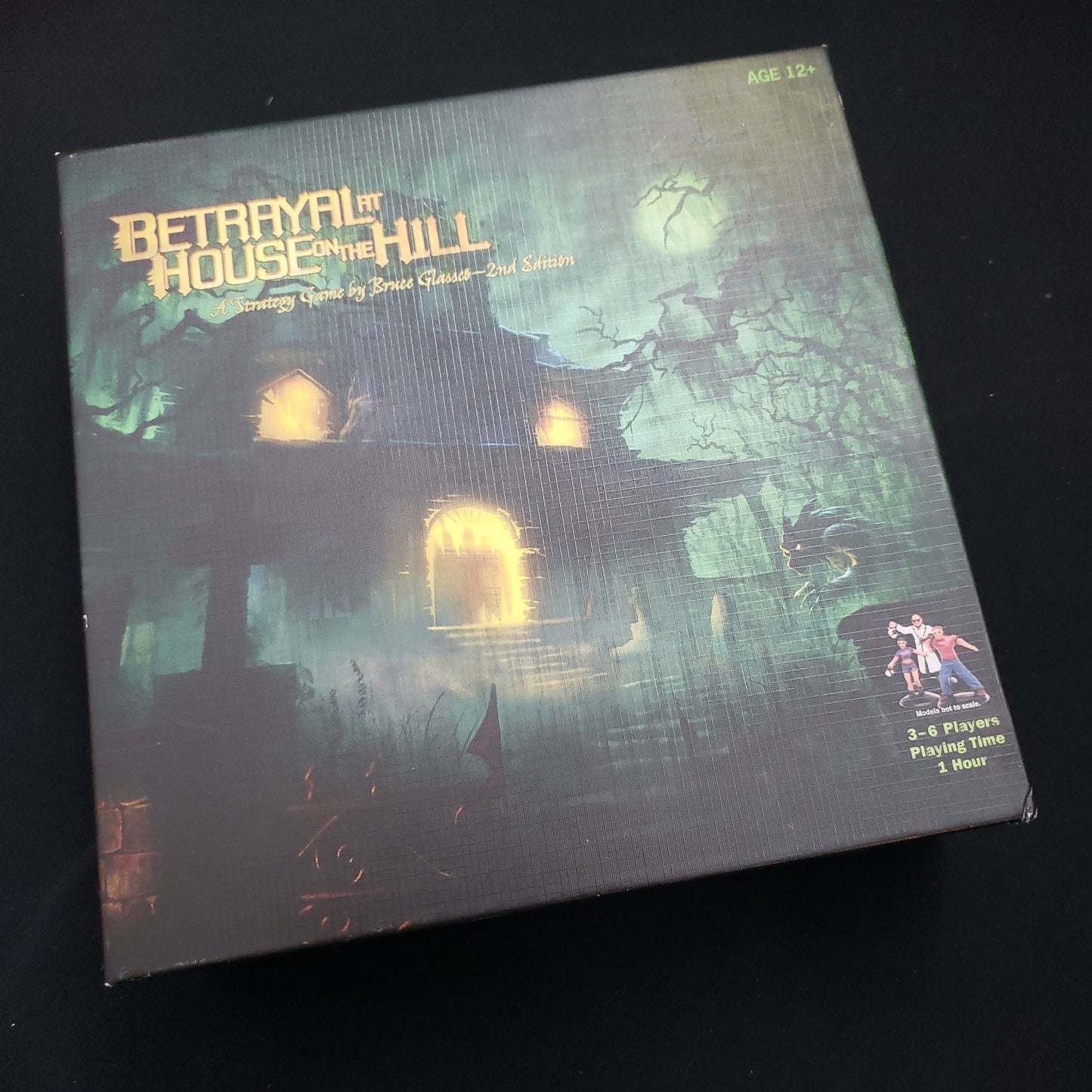 Image shows the front cover of the box of the Betrayal at House on the Hill board game