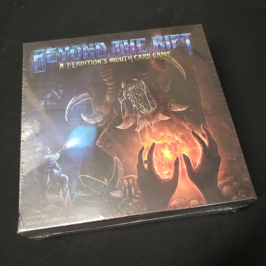 Image shows the front cover of the box of the Beyond the Rift card game