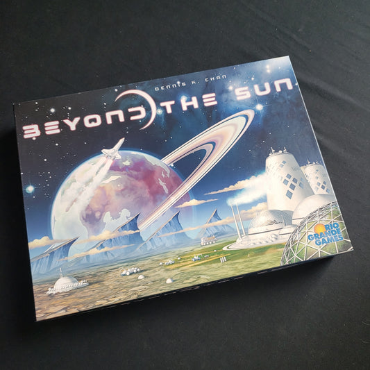 Image shows the front cover of the box of the Beyond the Sun board game
