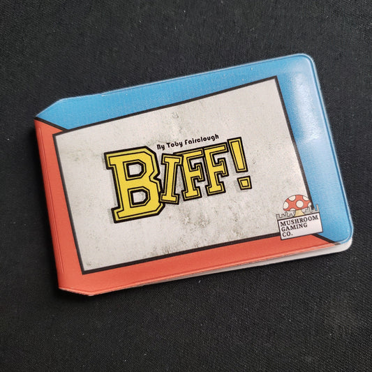 Image shows the front cover of the package of the Biff! card game