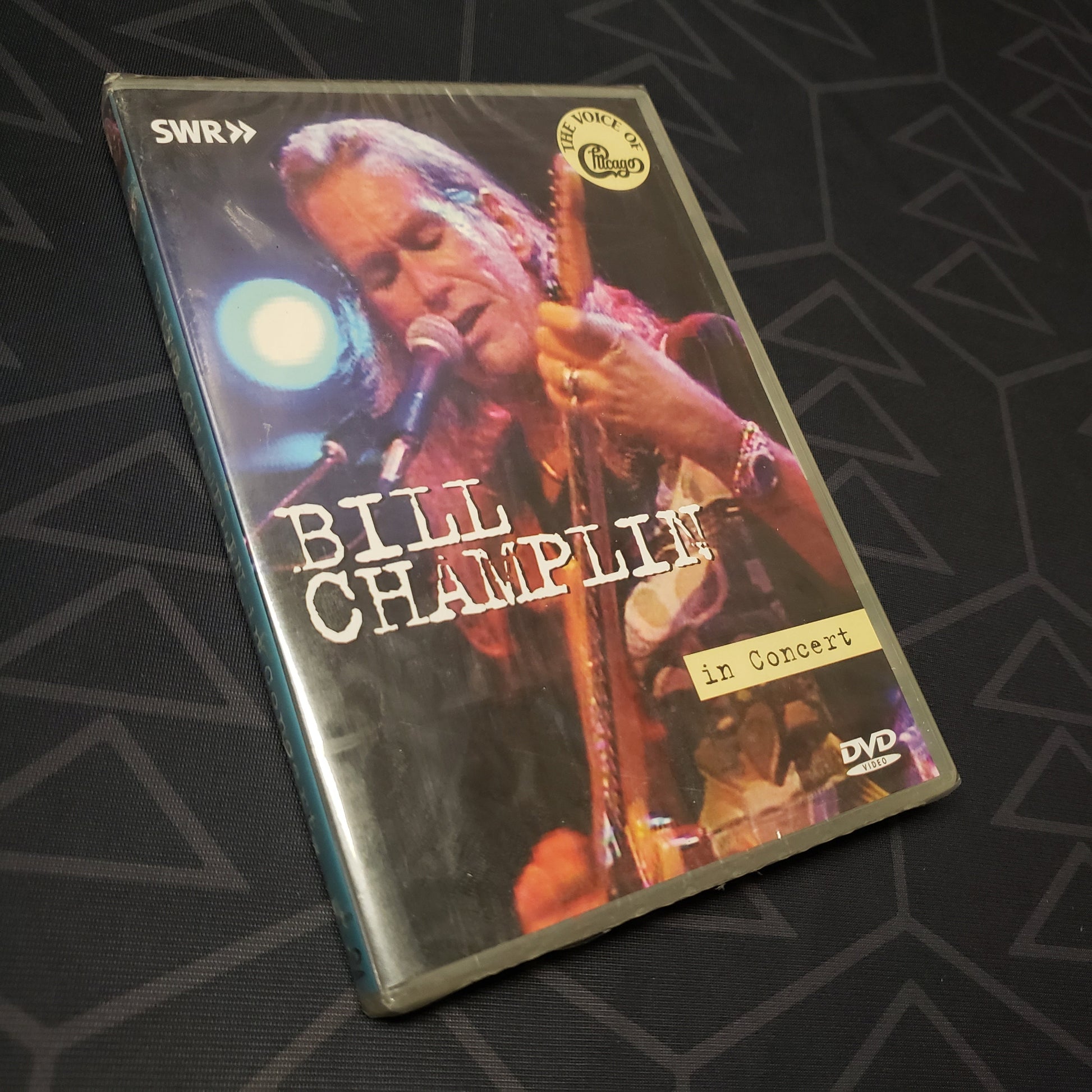 Image shows the front of the case for the live concert film Bill Champlin: In Concert on DVD