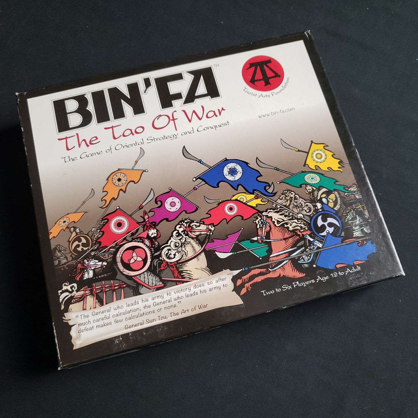 Image shows the front cover of the box of the Bin'Fa: The Tao of War board game