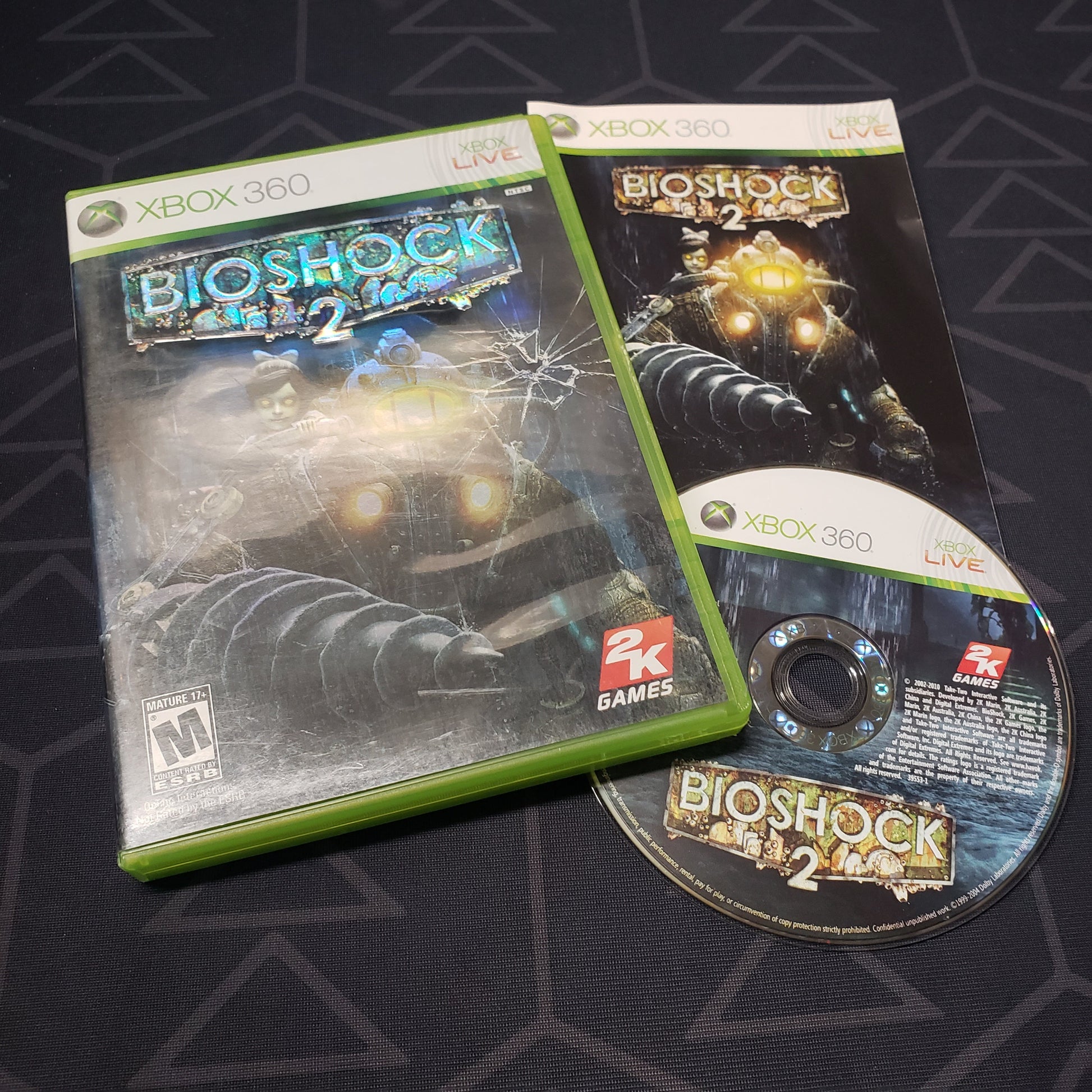 Image shows the case, manual and disc for the video game Bioshock 2 for Xbox 360