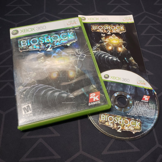 Image shows the case, manual and disc for the video game Bioshock 2 for Xbox 360