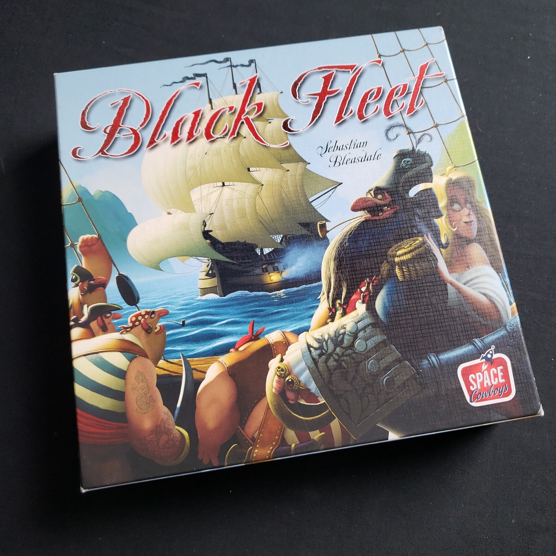 Image shows the front cover of the box of the Black Fleet board game