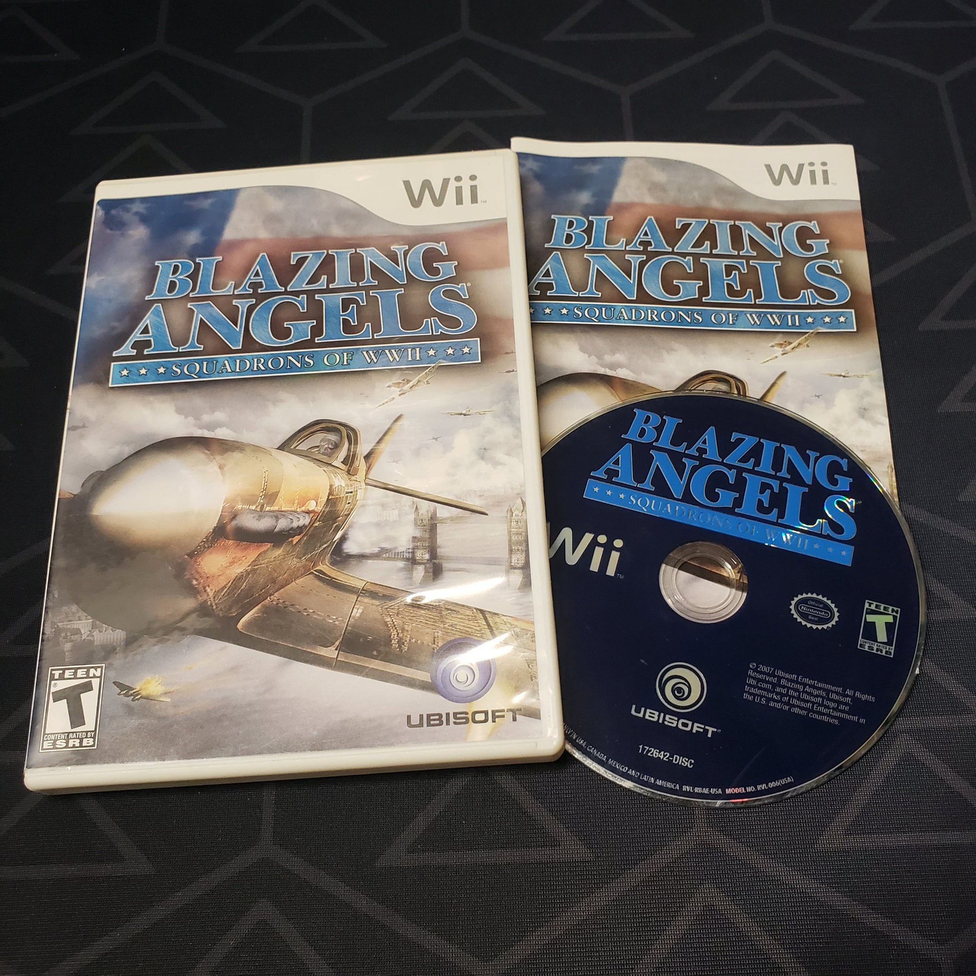 Image shows the case, manual & disc for the video game Blazing Angels: Squadrons of WWII for Nintendo Wii