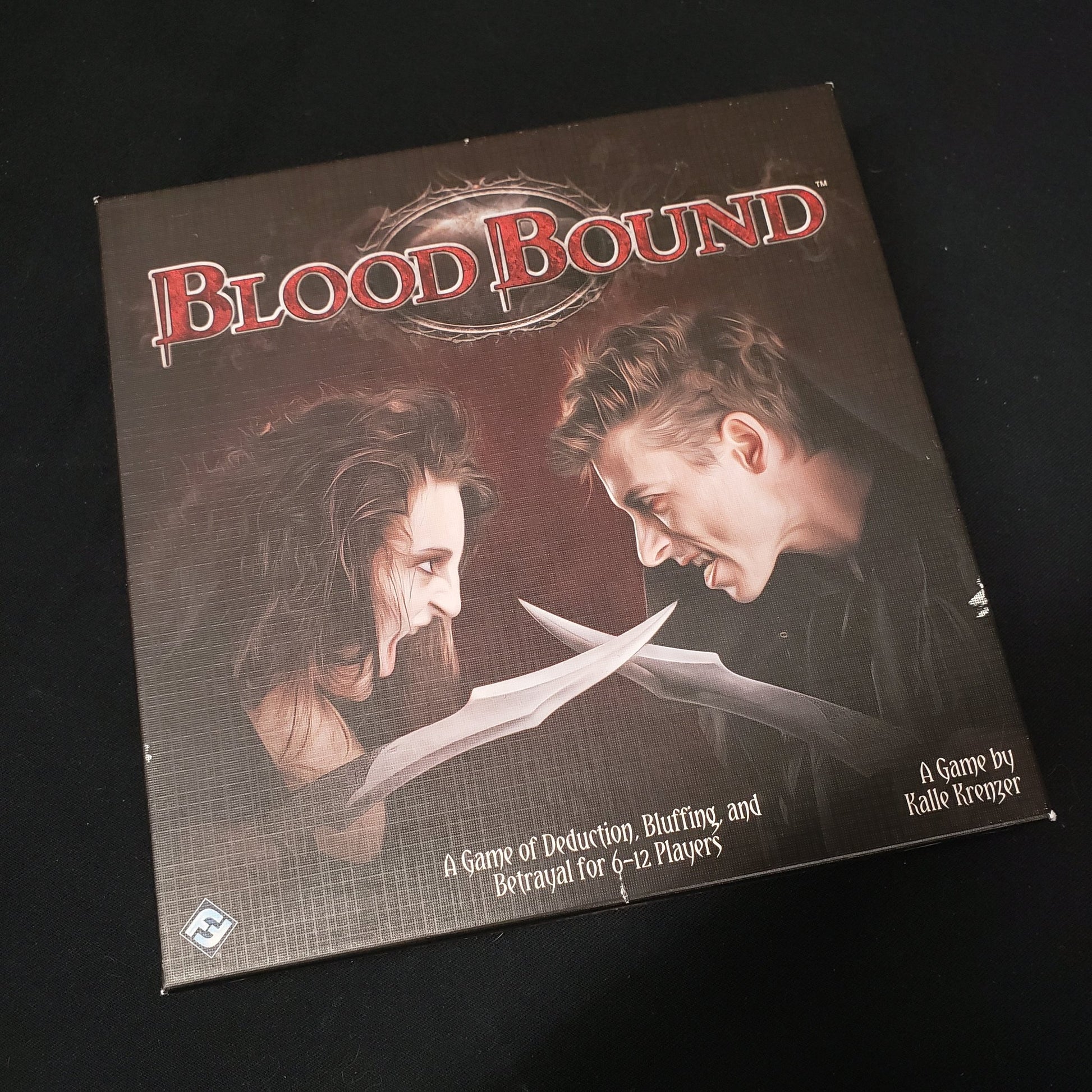 Image shows the front cover of the box of the Blood Bound party game