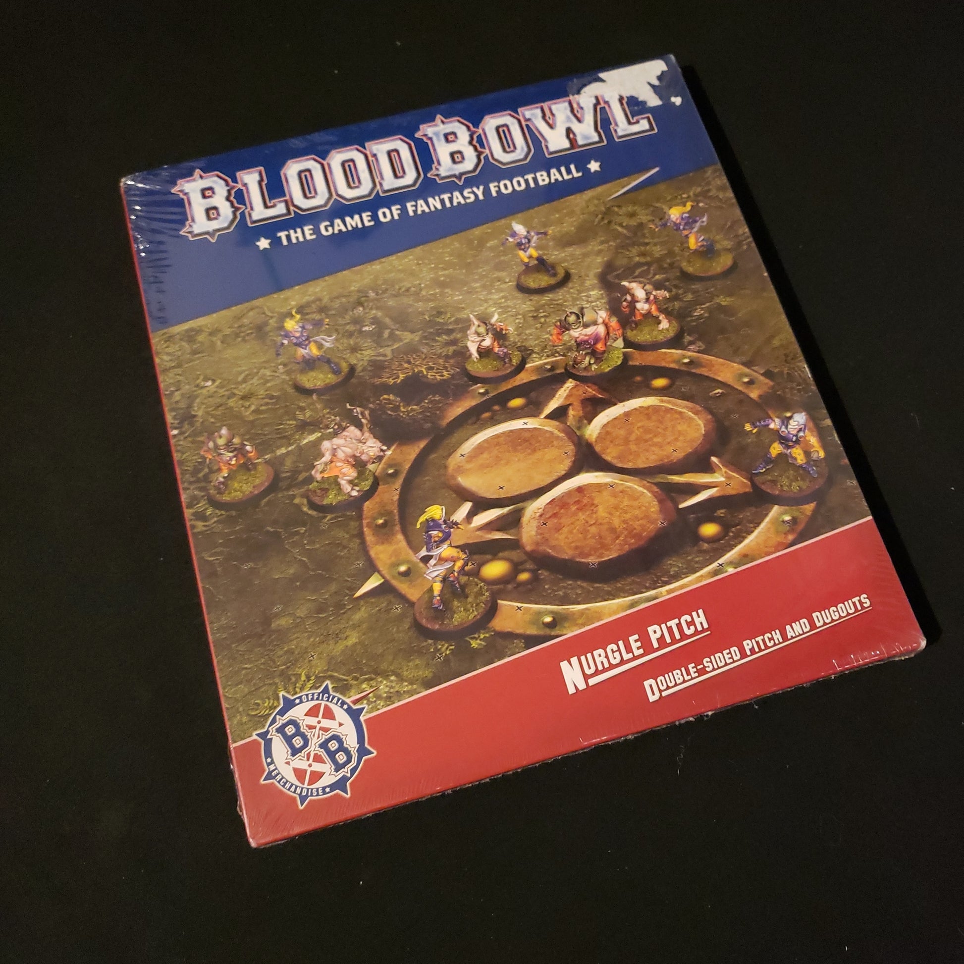 Image shows the front of the package for the Nurgle Pitch & Dugout Pack for the Blood Bowl miniatures game