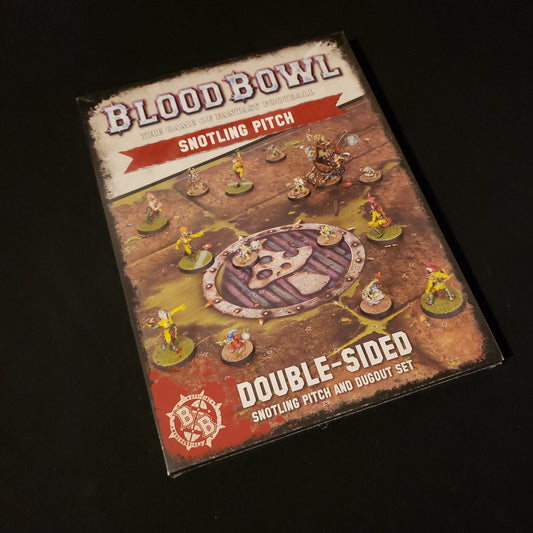 Image shows the front of the package for the Snotling Pitch & Dugout Pack for the Blood Bowl miniatures game