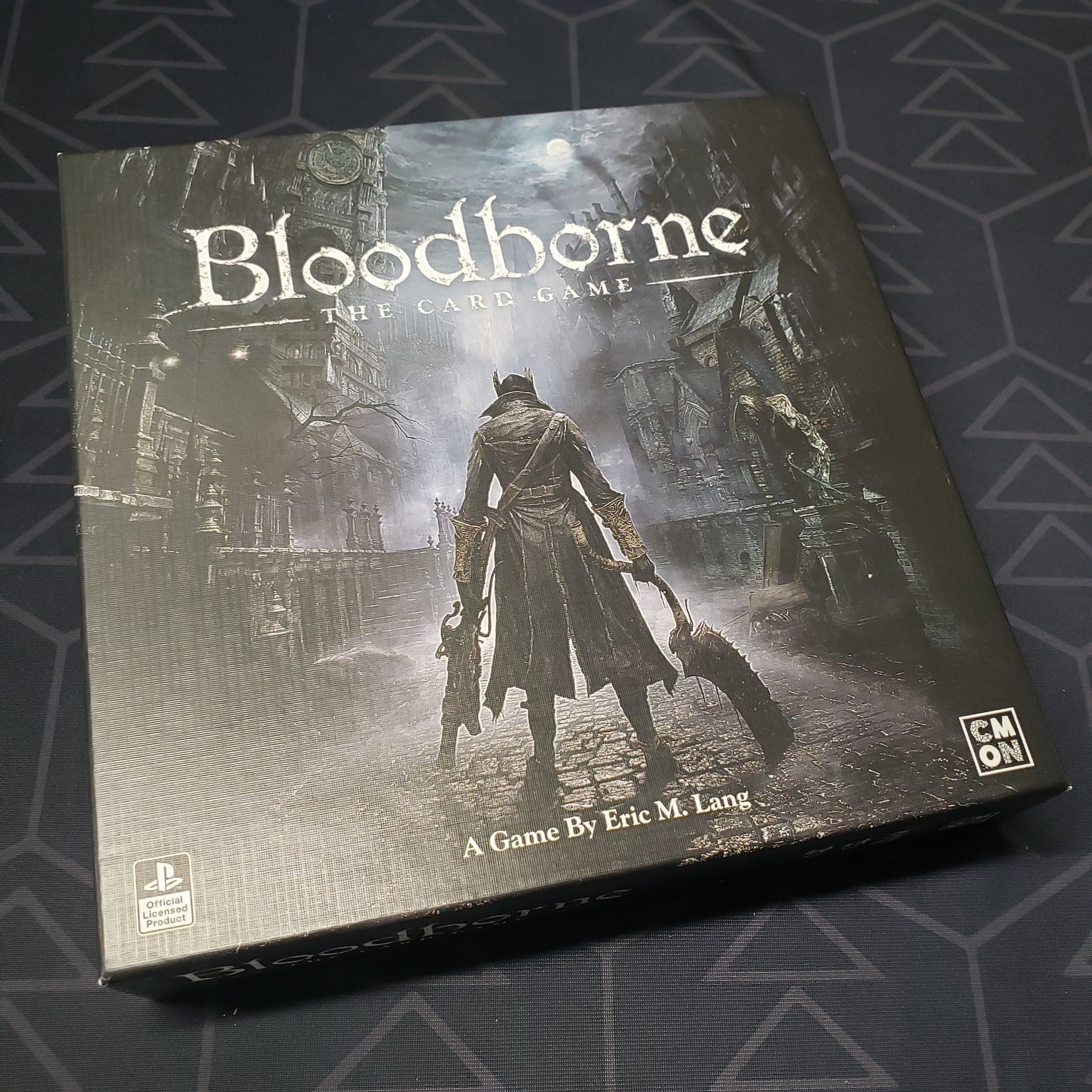 Image shows the front cover of the box for Bloodborne: The Card Game