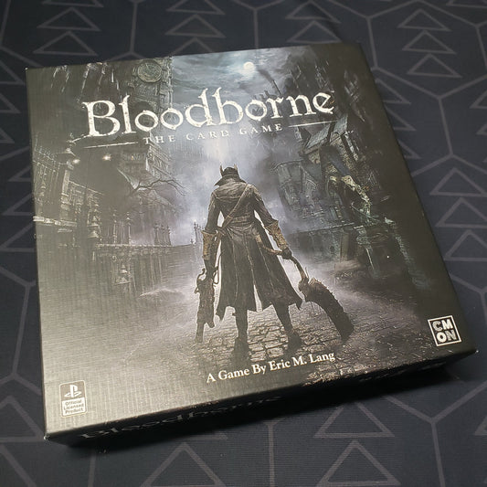 Image shows the front cover of the box for Bloodborne: The Card Game