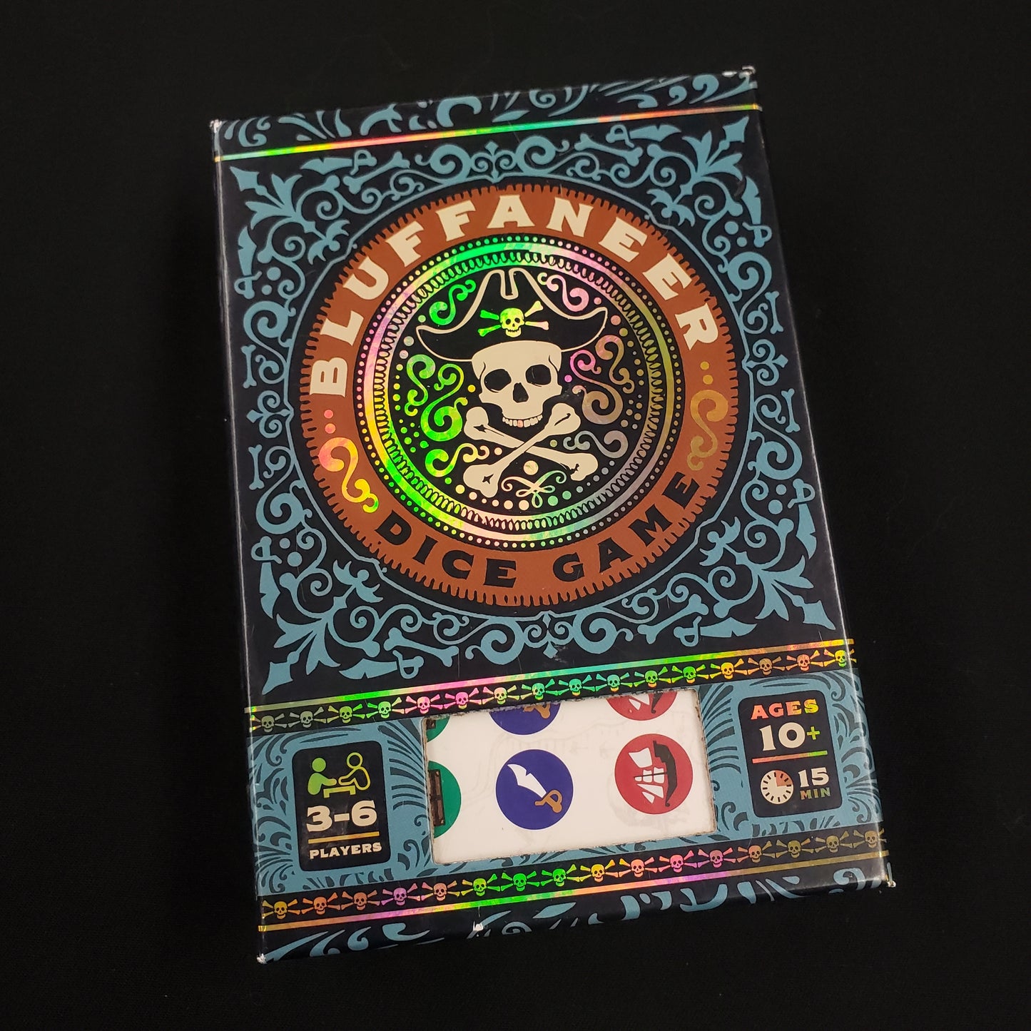 Image shows the front cover of the box of the Bluffaneer dice game