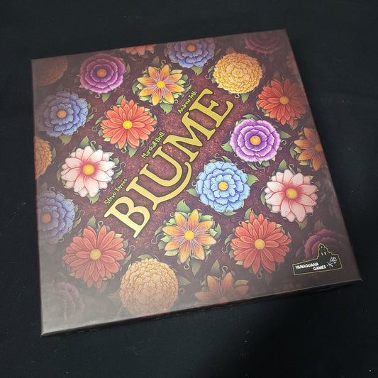 Image shows the front cover of the box of the Blume board game