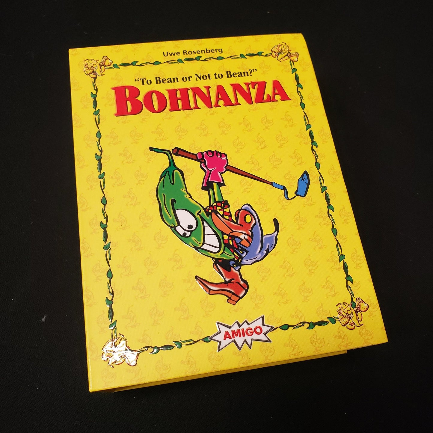 Image shows the front cover of the box of the Bohnanza: 25th Anniversary Edition card game