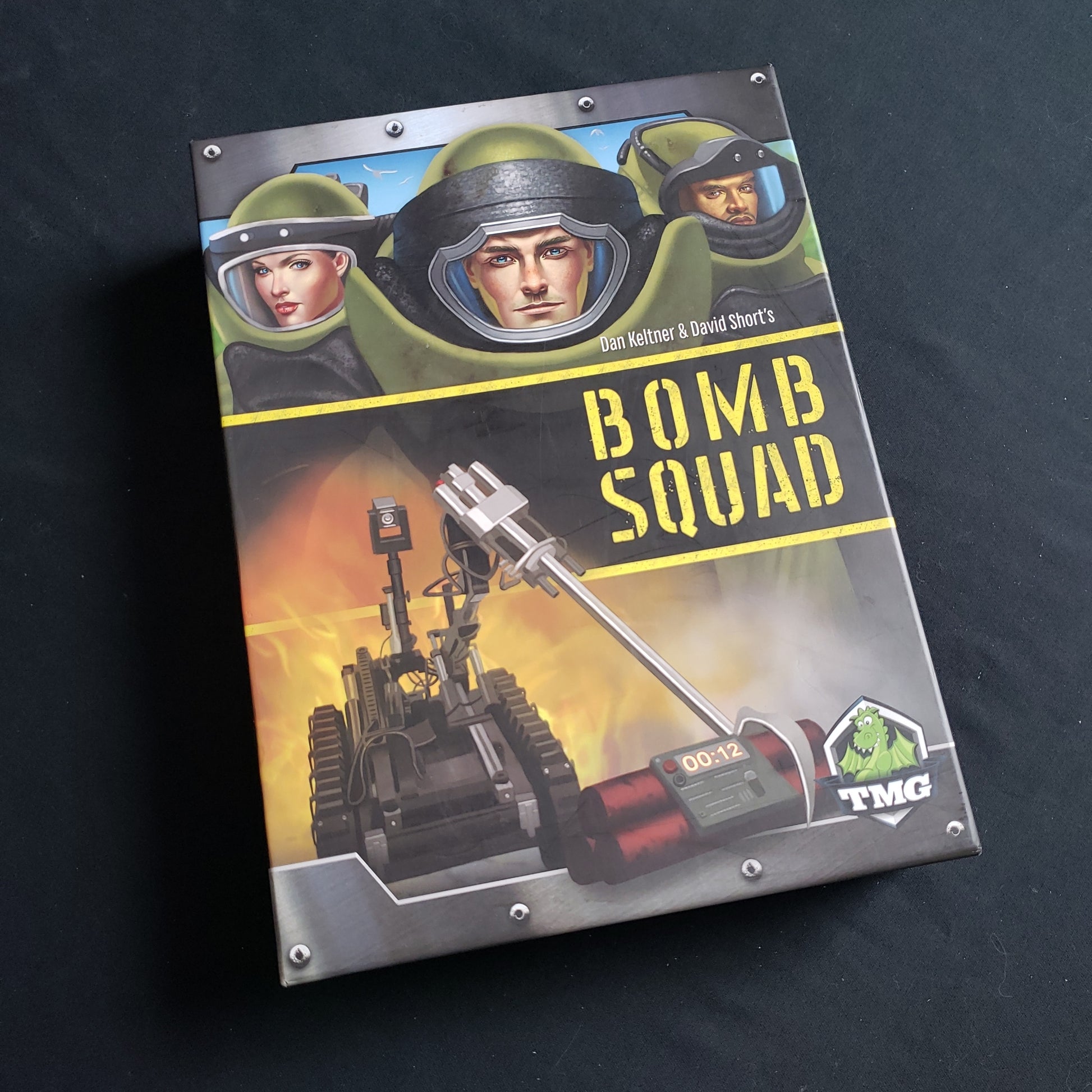 Image shows the front cover of the box of the Bomb Squad board game