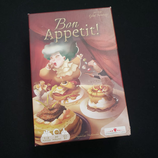 Image shows the front cover of the box of the Bon Appetit! card game