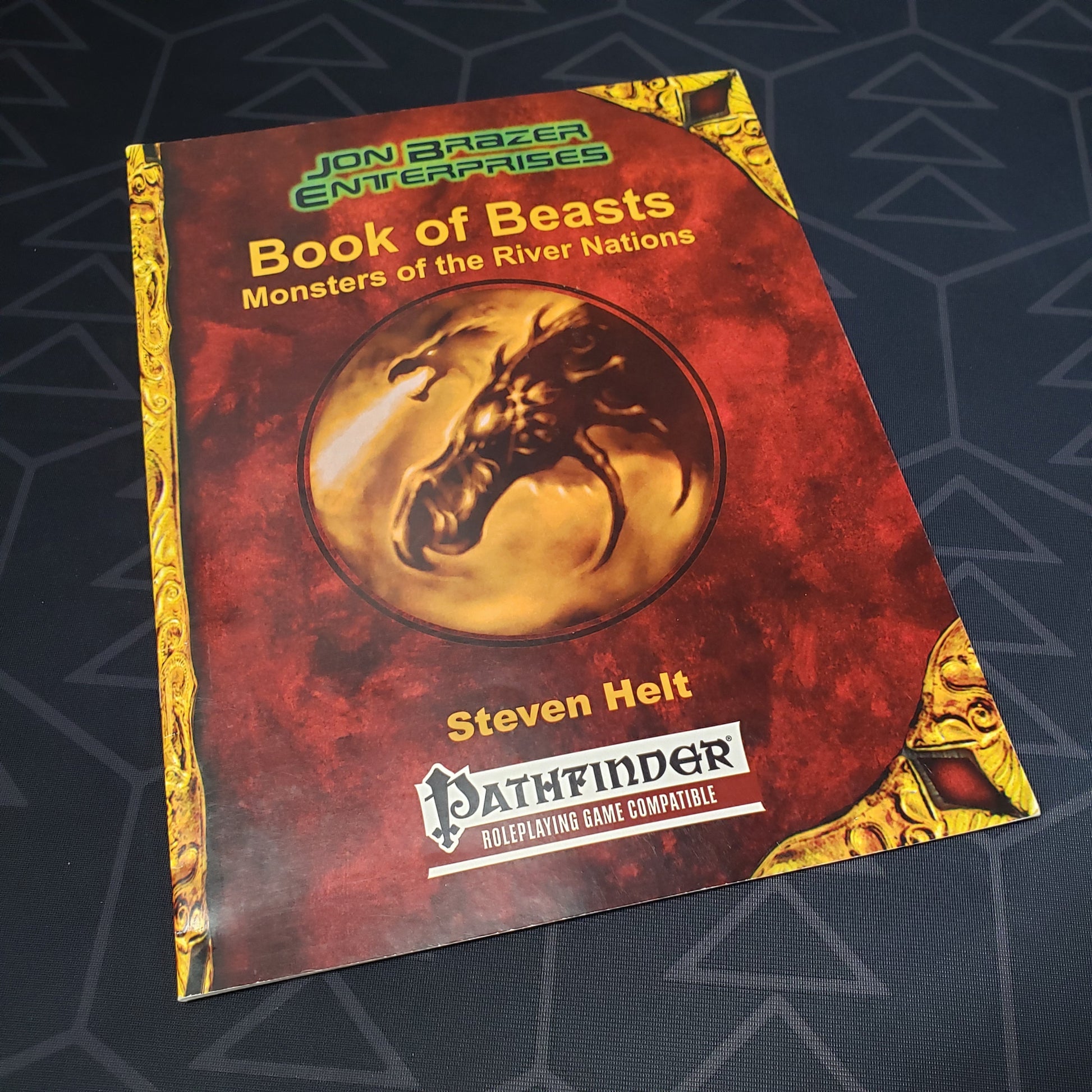 Image shows the front cover of the Book of Beasts: Monsters of the River Nations roleplaying game book