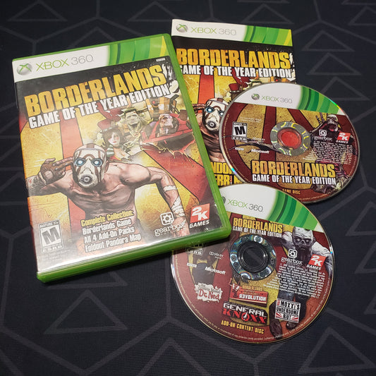 Image shows the case, manual and two discs for the video game Borderlands: Game of the Year Edition for Xbox 360
