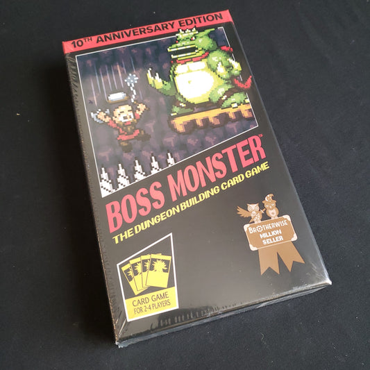 Image shows the front cover of the box of the Boss Monster: 10th Anniversary Edition card game