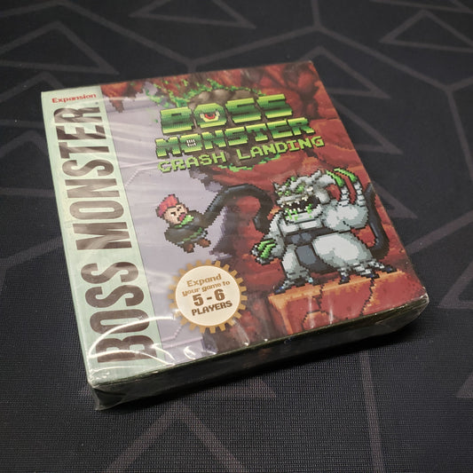 Image shows the front cover of the box of the Crash Landing expansion for the card game Boss Monster