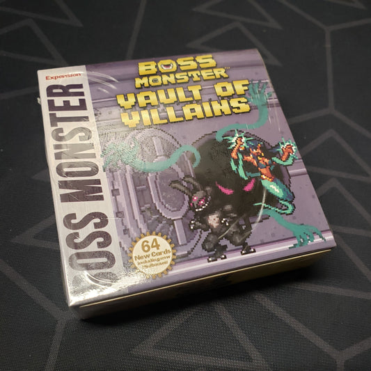 Image shows the front cover of the box of the Vault of Villains expansion for the card game Boss Monster