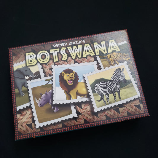 Image shows the front cover of the box of the Botswana card game