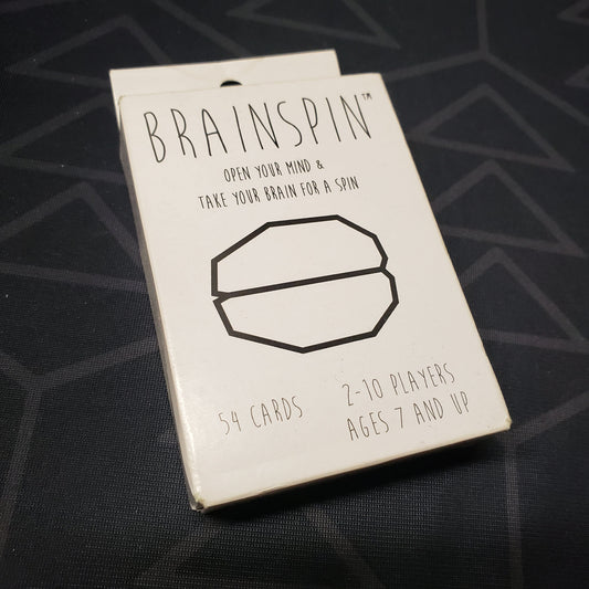 Image shows the front cover of the box for the BrainSpin card game