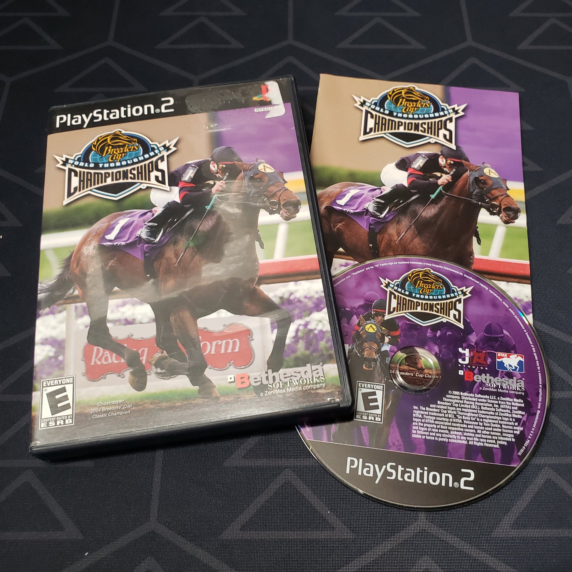 Image shows the case, manual & disc for the video game Breeders' Cup World Thoroughbred Championships for Playstation 2