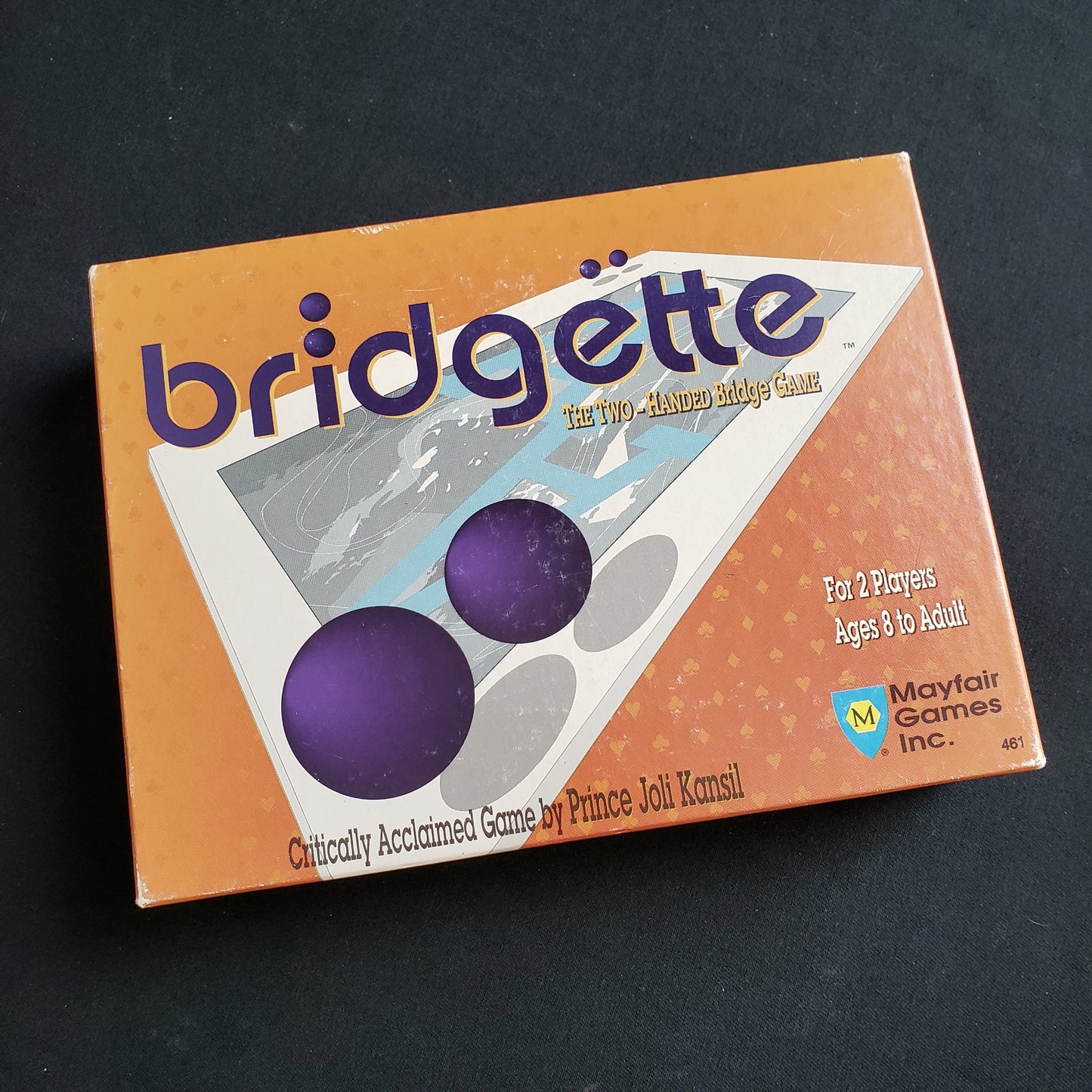 Image shows the front cover of the box of the Bridgette card game