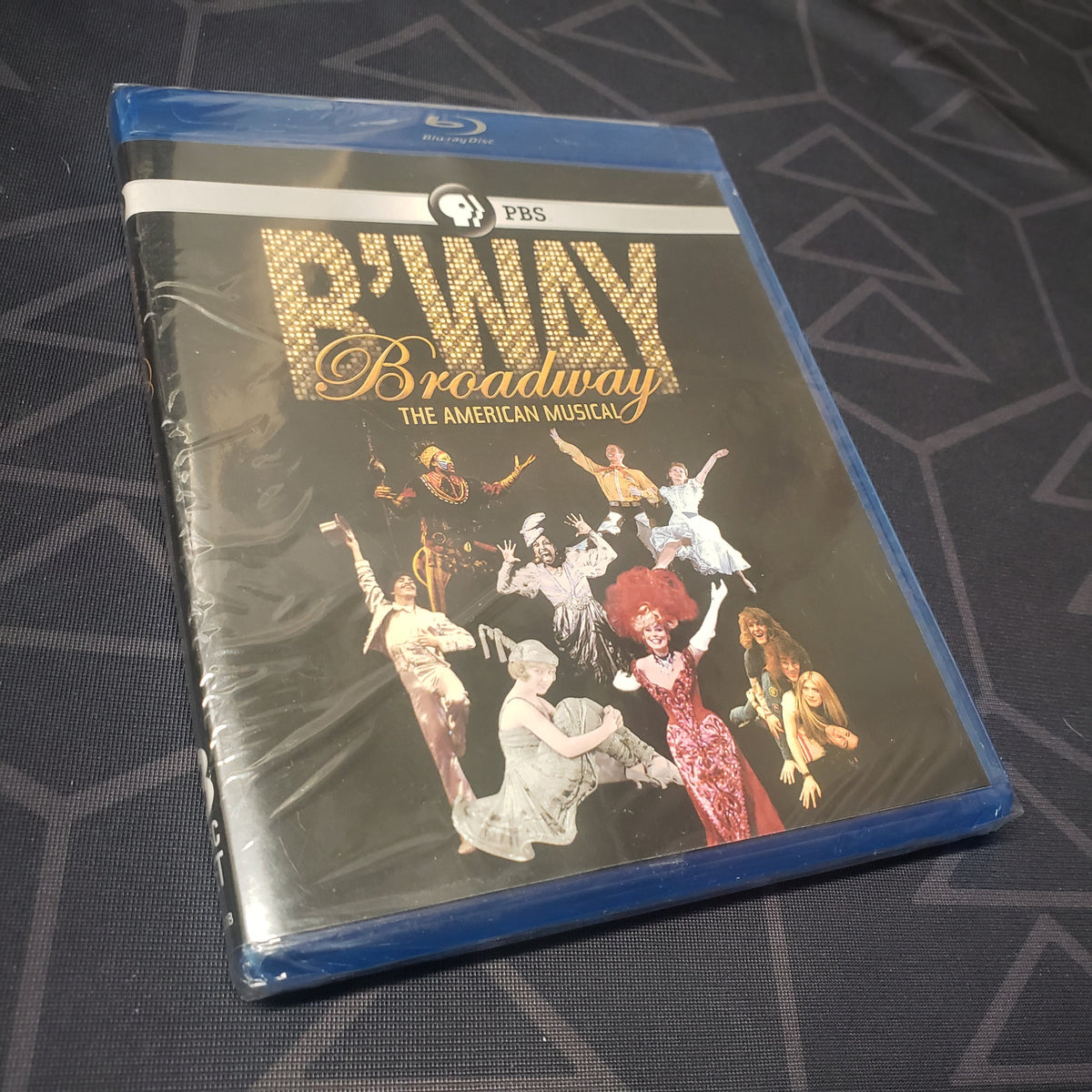 Image shows the front of the case for the series box set of Broadway: The American Musical on Blu-Ray