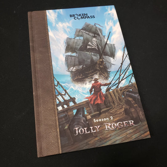 Image shows the front cover of the Season 2: Jolly Roger book for the roleplaying game Broken Compass