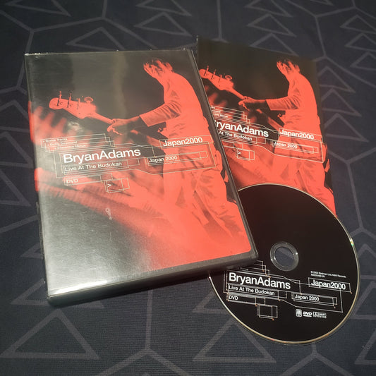 Image shows the case, insert & disc for the concert film Bryan Adams: Live at the Budokan on DVD