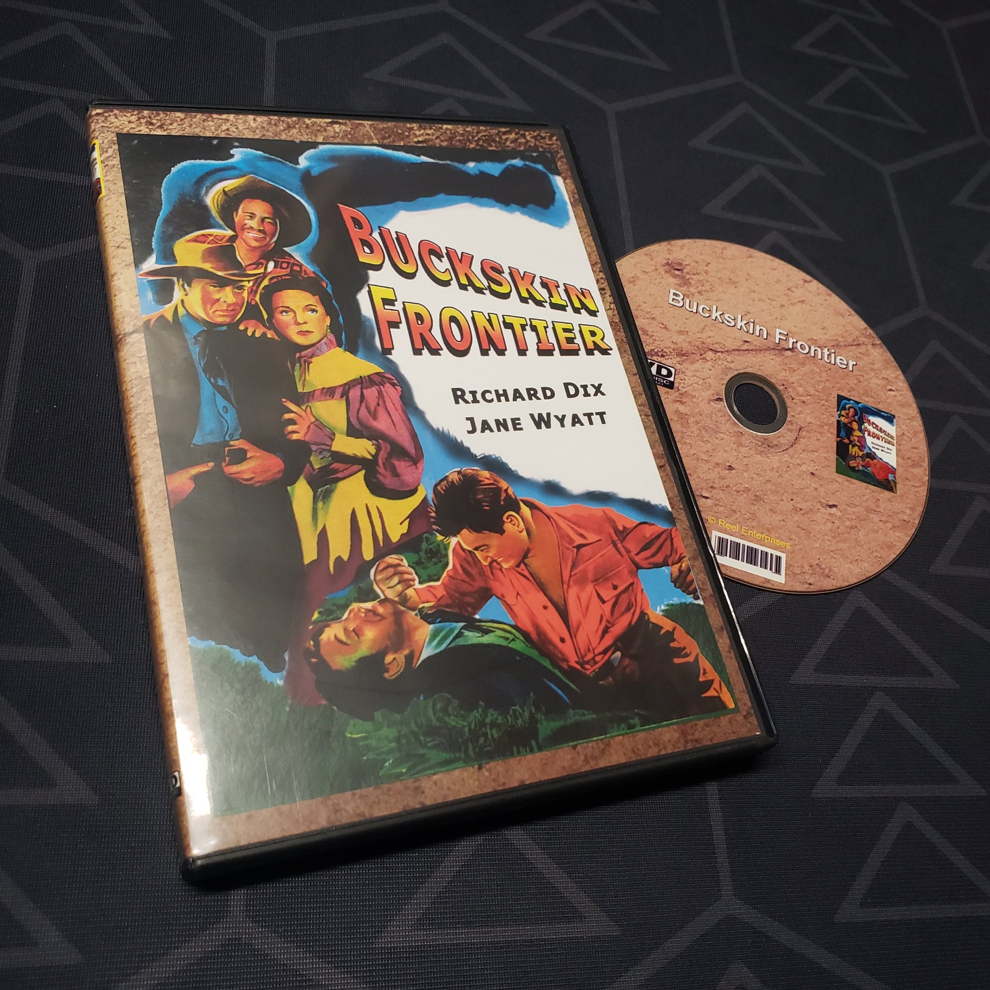 Image shows the case & disc for the 1943 movie Buckskin Frontier on DVD