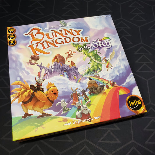 Image shows the front cover of the box of the In the Sky expansion for the board game Bunny Kingdom
