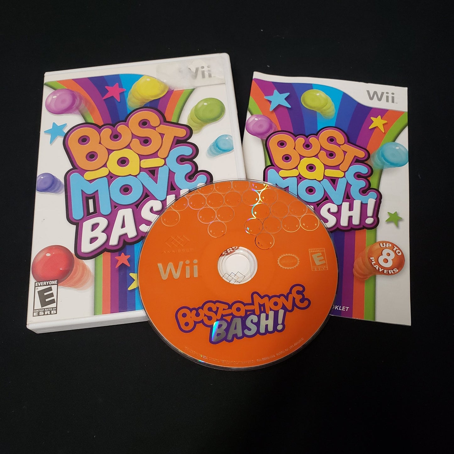 Image shows the case, manual & disc for the video game Bust-A-Move Bash! for Nintendo Wii