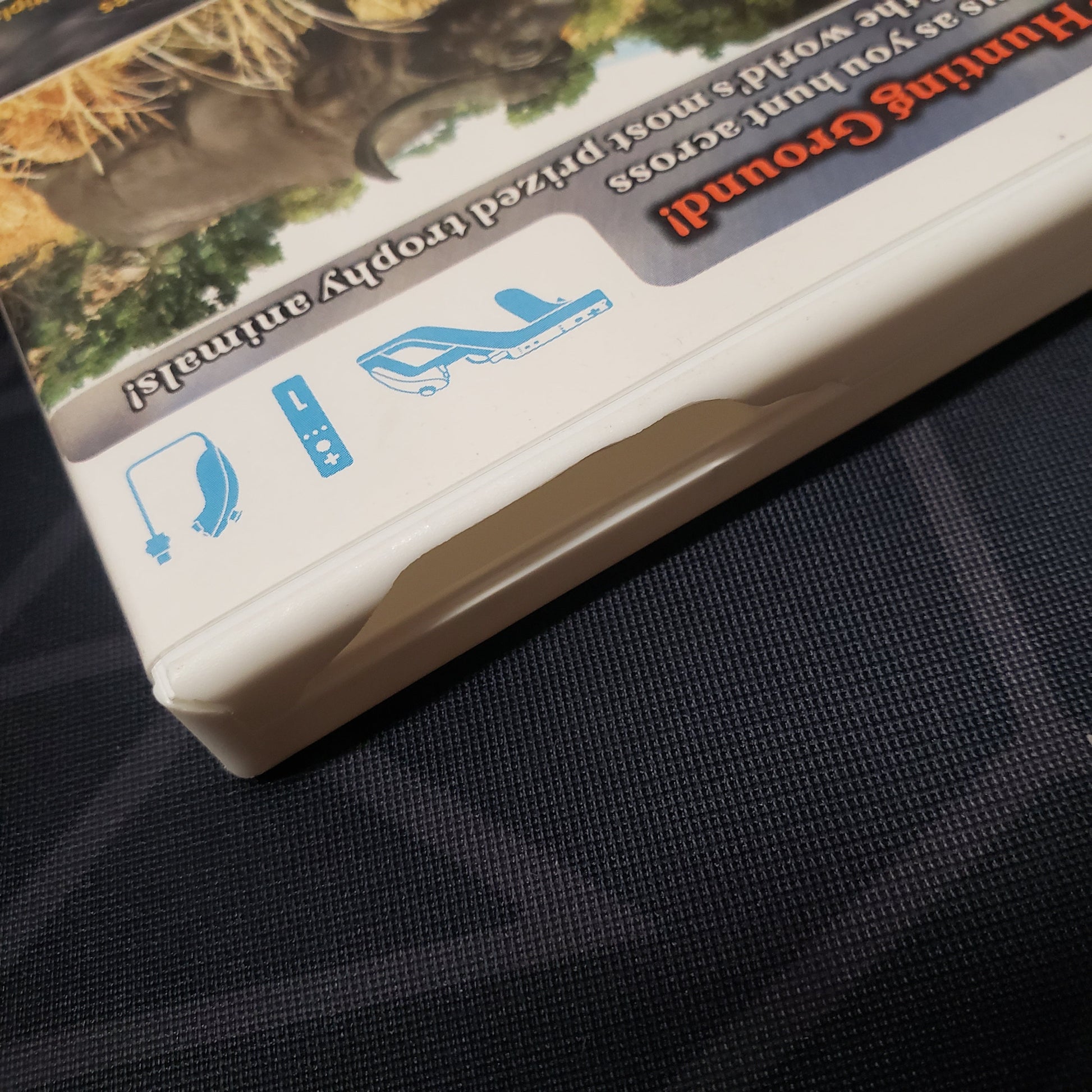 Image shows some damage to the case for the video game Cabela's Big Game Hunter 2010 for Nintendo Wii
