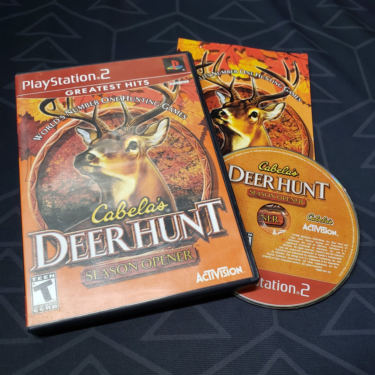 Image shows the case, manual and disc for the video game Cabela's Deer Hunt: Season Opener for Playstation 2