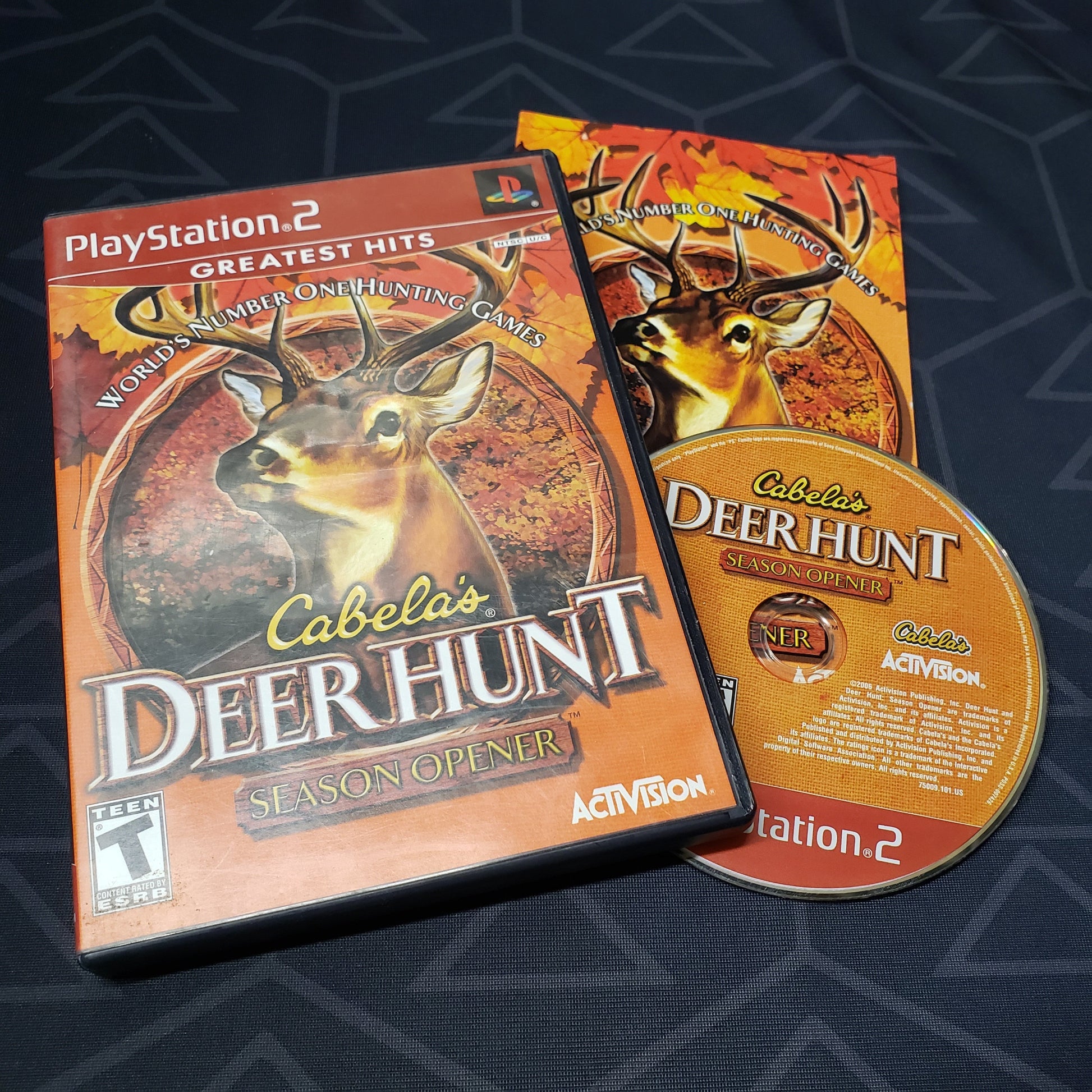 Image shows the case, manual and disc for the video game Cabela's Deer Hunt: Season Opener for Playstation 2