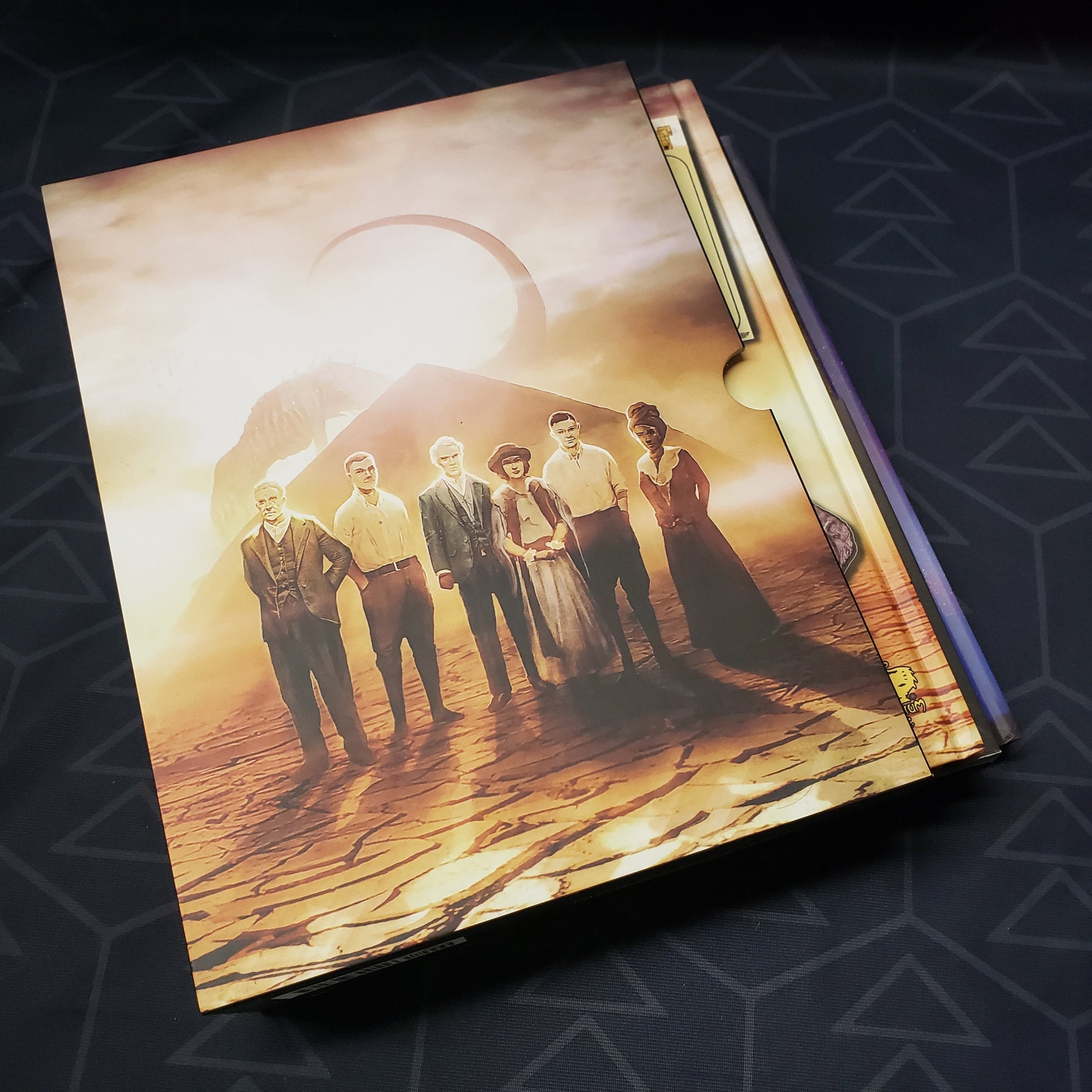 Image shows the front cover of the Masks of Nyarlathotep Slipcase Box Set for the roleplaying game Call of Cthulhu 7E