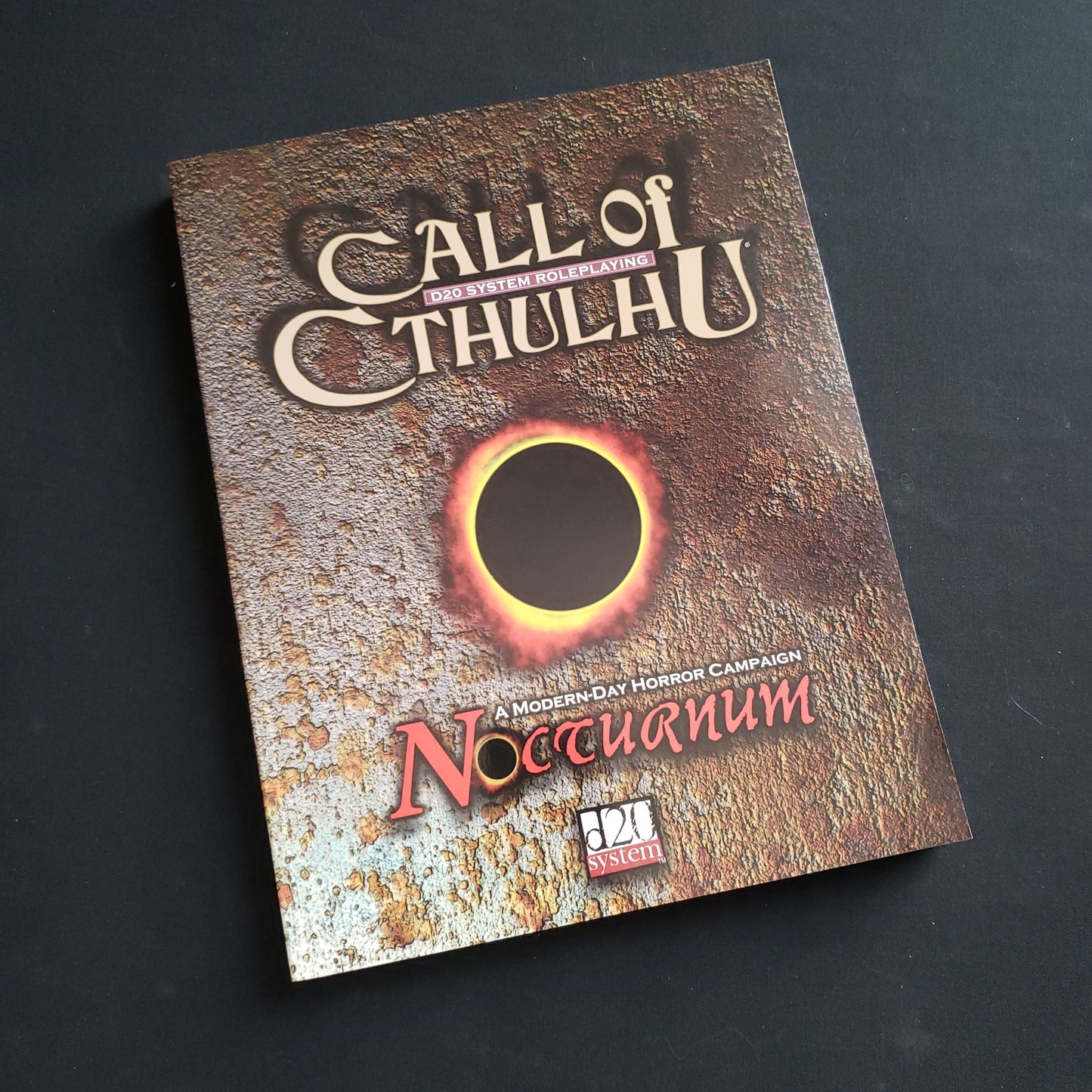 Image shows the front cover of the Call of Cthulhu: Nocturnum roleplaying game book